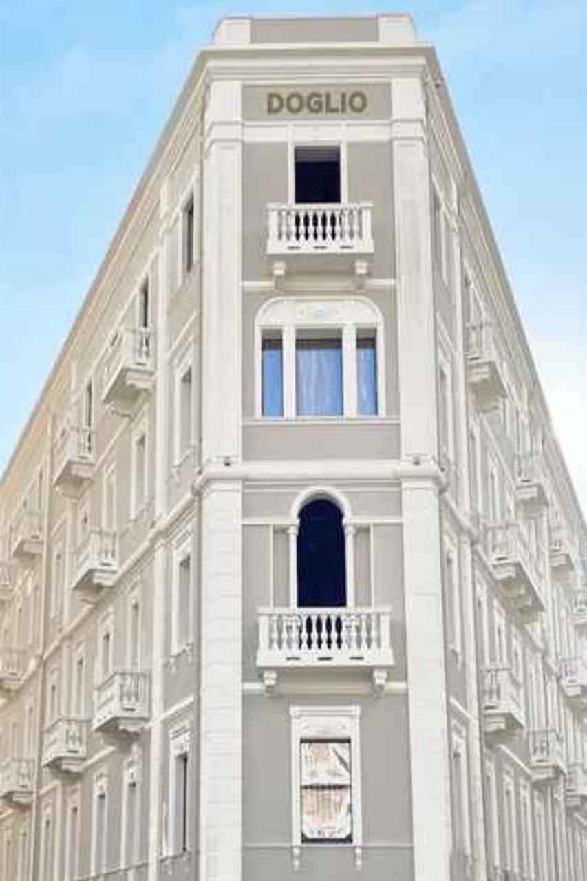 Hotel Palazzo Doglio Cagliari Esterno foto The facade of the building