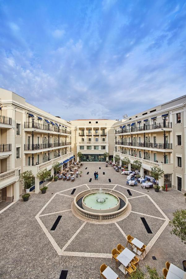 Hotel Palazzo Doglio Cagliari Esterno foto The courtyard of the hotel