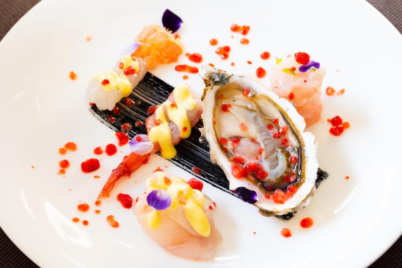 Hotel Palazzo Doglio Cagliari Esterno foto Oyster with caviar