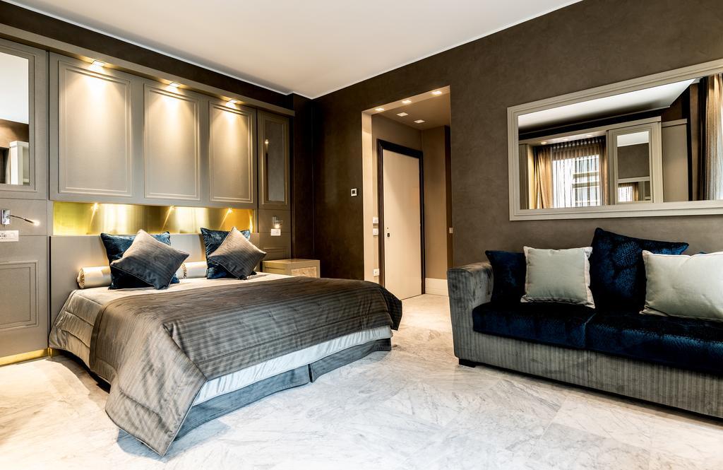 Hotel Palazzo Doglio Cagliari Esterno foto A bedroom
